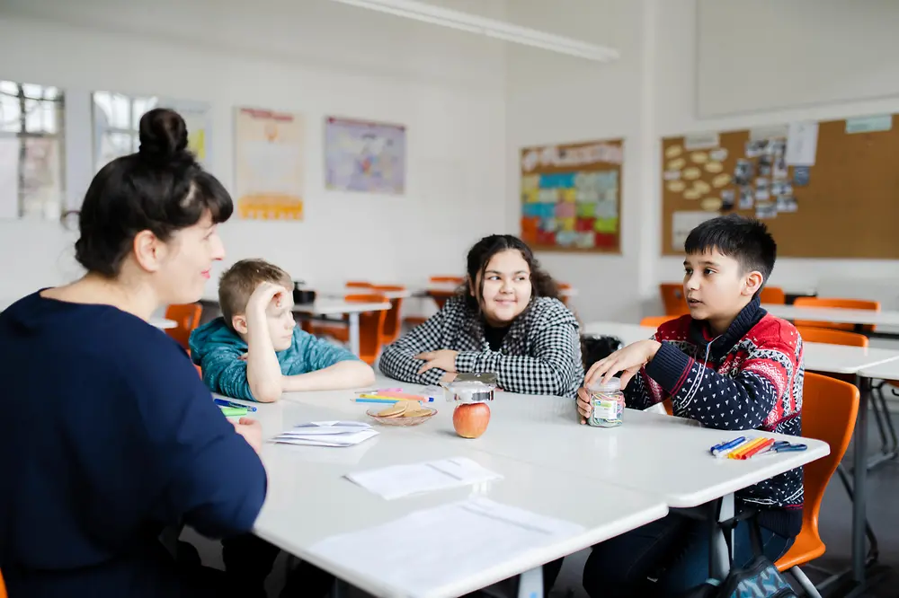 The Fellows support the students in their daily life at school.